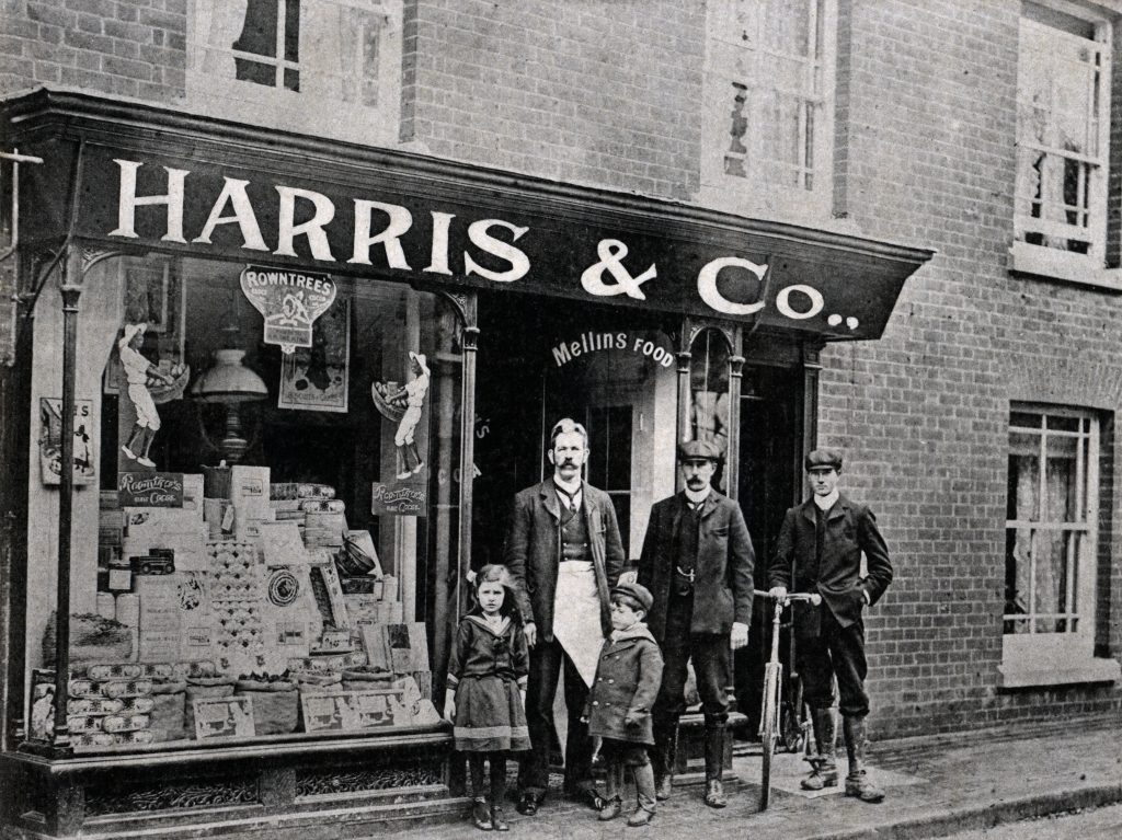 Black and White Image of a shop called Harris & Co that can be found in the Hampshire directories on TheGenealogist